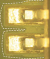 Figure 1. Partially attacked flux residues (so-called 'white residues')
	